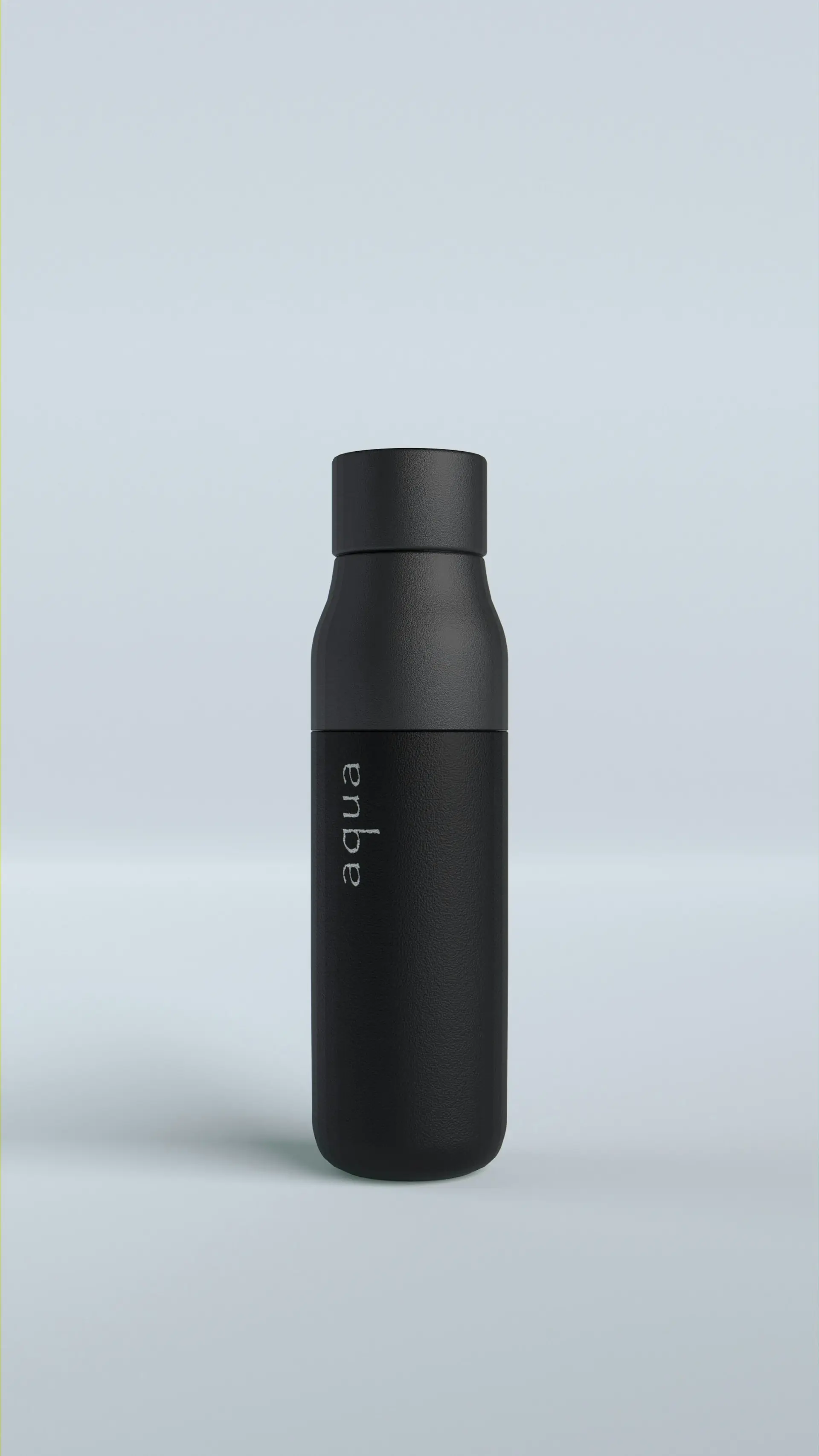 A matte black litre bottle on a white ground.
