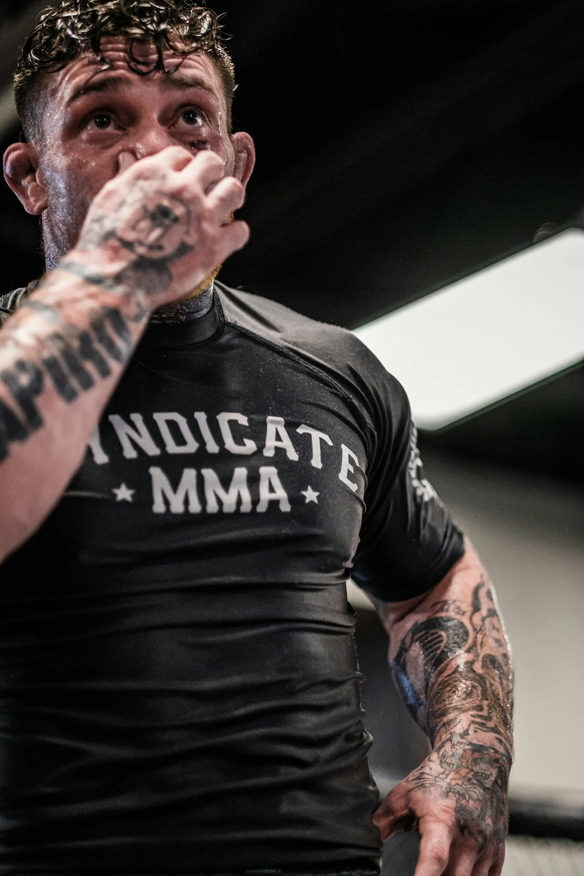 A man in a fitted black base layer.